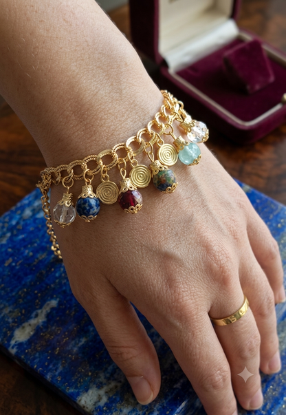 Multicolor charms bracelet for women featuring an assortment of colorful decorative charms on a chain