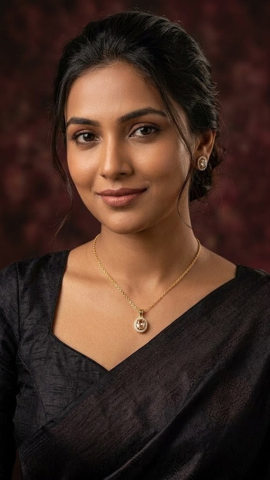 Gold plated oval halo pendant necklace with champagne cubic zirconia stone on cable chain