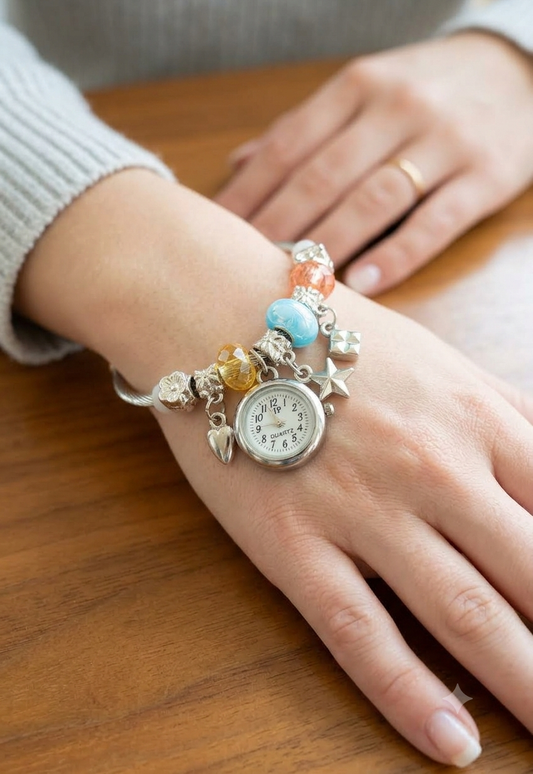 Women's bracelet watch with multicolor beads and decorative charms around the strap, featuring a round analog dial