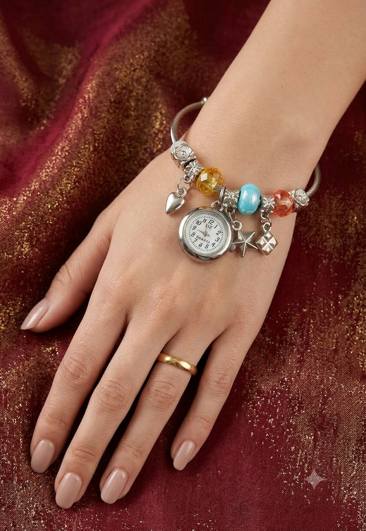 Women's bracelet watch with multicolor beads and decorative charms around the strap, featuring a round analog dial